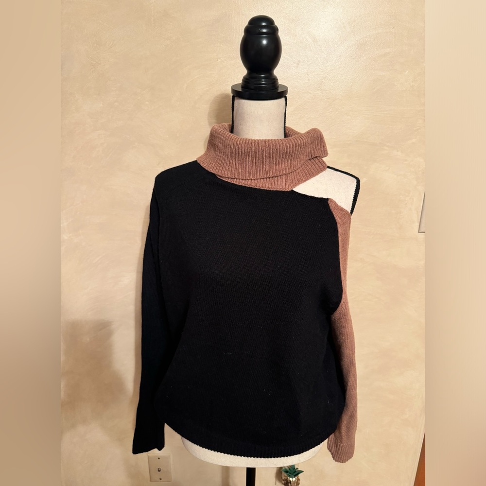 Gently used color block Jamison sweater with cutout detail.  Size medium.